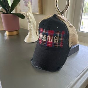 NWT Trucker hat. Plaid patch saying Heritage.